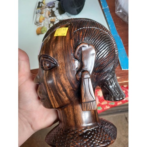 418 - Hardwood heavily carved African warrior