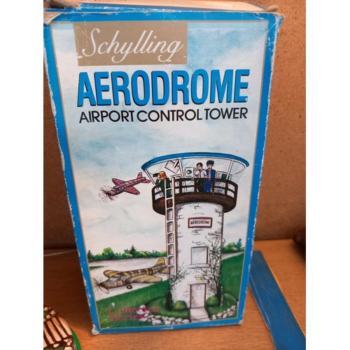 440 - Boxed clockwork early aerodrome toy - fairground type toy