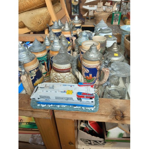 524 - Collection of vintage German lidded steins (some marked) pewter, metal lids