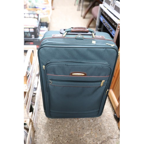 187 - Qty of various suitcases