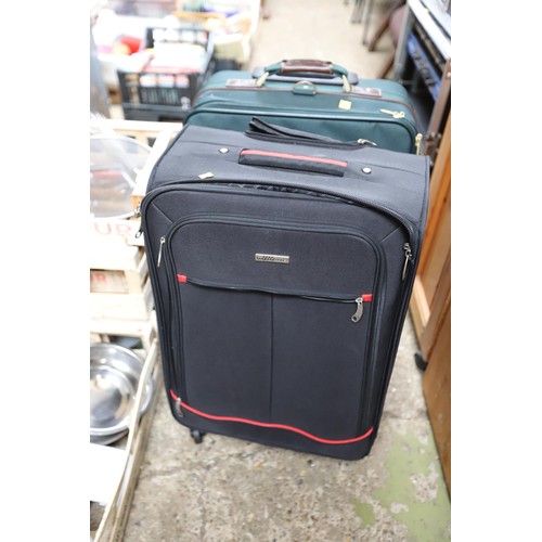 187 - Qty of various suitcases