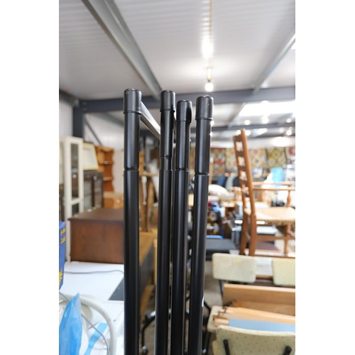 196 - 4 black metal hanging rails