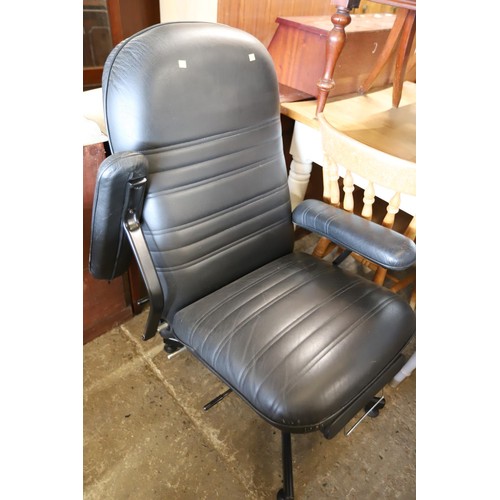 548 - Black leather designer armchair