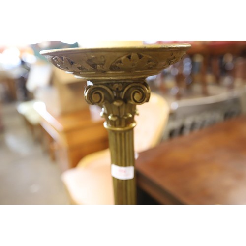 556 - Gilt corinthian column candle stand