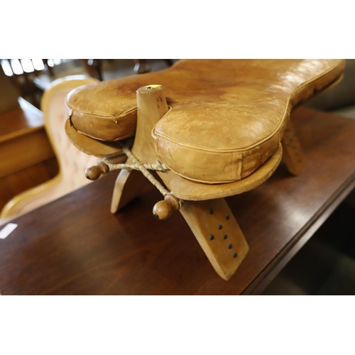 557 - Leather camel stool