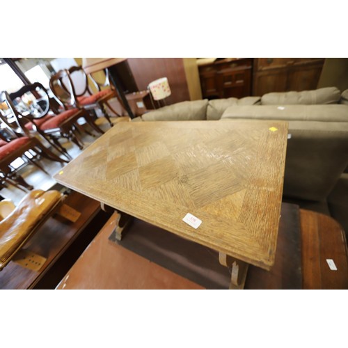 558 - Interesting oak coffee table - shield ends