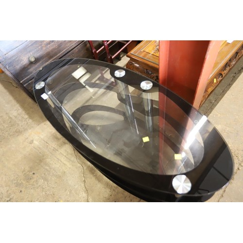 578 - Oval glass TV unit