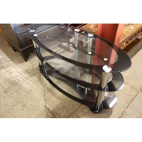 578 - Oval glass TV unit