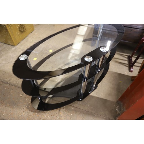 578 - Oval glass TV unit