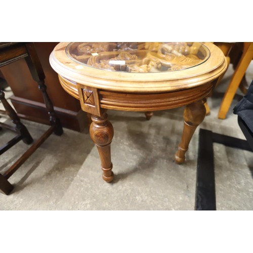 587 - Small circular carved wood occasional table