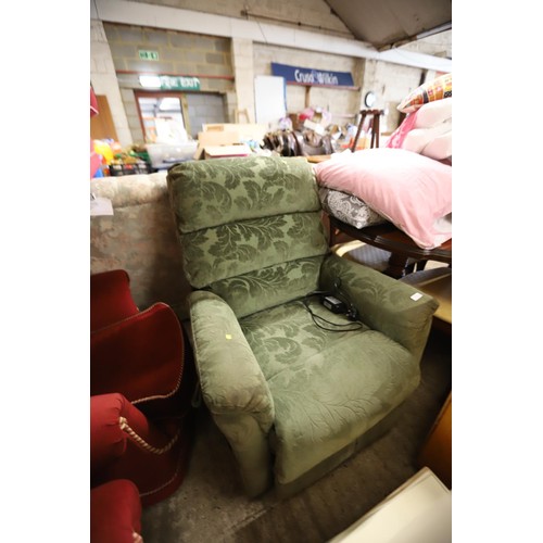 597 - Green electric reclining armchair - warranted until 12 noon Tuesday following the above sale