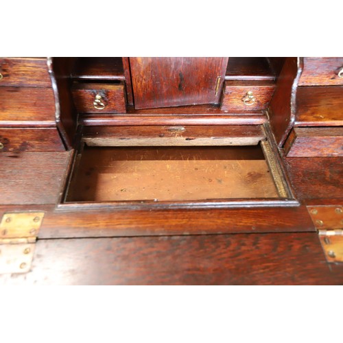 608 - Antique oak bureau - multiple compartments