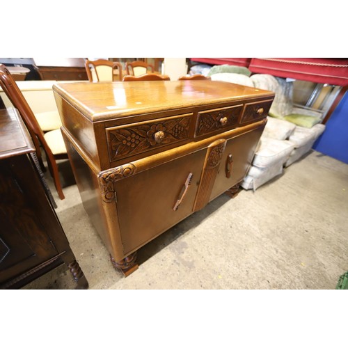 614 - Carved oak sideboard