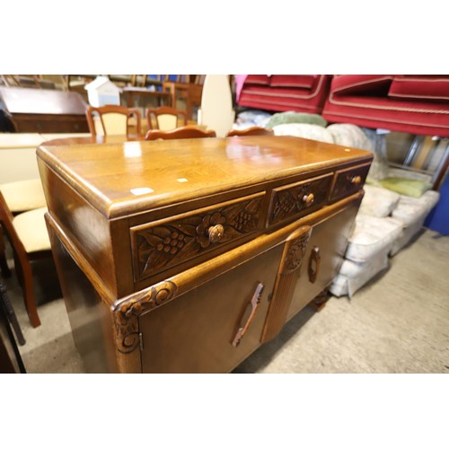 614 - Carved oak sideboard