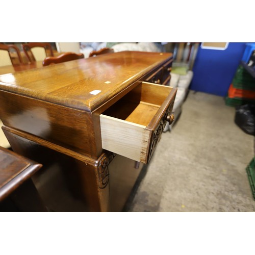 614 - Carved oak sideboard