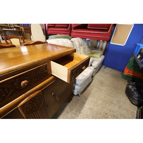 614 - Carved oak sideboard