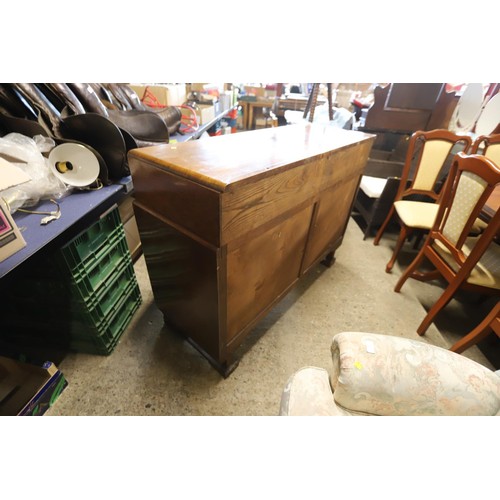 614 - Carved oak sideboard