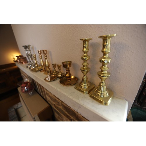 63 - 11 x brass & plated candlesticks