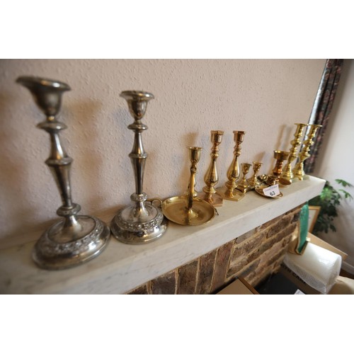 63 - 11 x brass & plated candlesticks