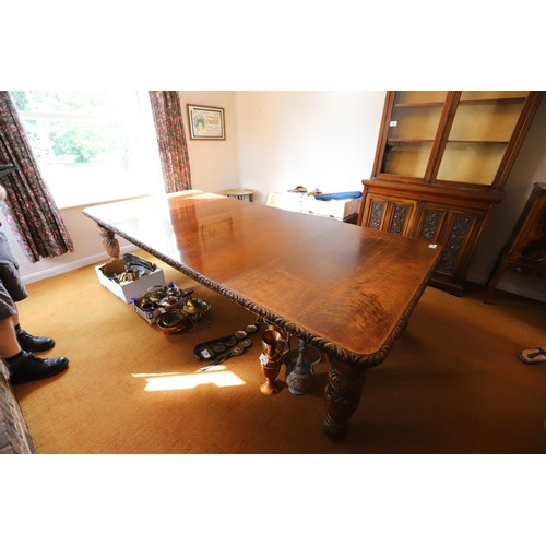 69 - Late Victorian \ early Edwardian heavily carved mahogany extending dining table with 3 extra leaves ... 