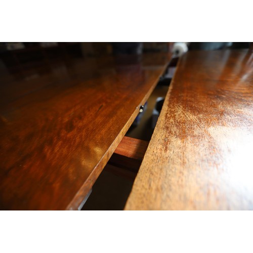 69 - Late Victorian \ early Edwardian heavily carved mahogany extending dining table with 3 extra leaves ... 