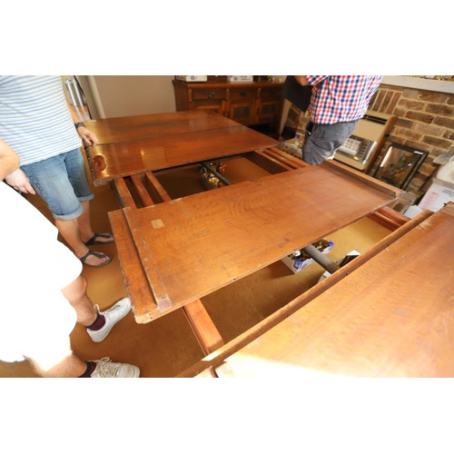 69 - Late Victorian \ early Edwardian heavily carved mahogany extending dining table with 3 extra leaves ... 