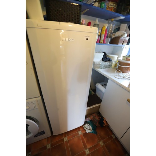 32 - Beko  upright freezer with five draws- to be tested and rewired & installed by a qualified electrici... 