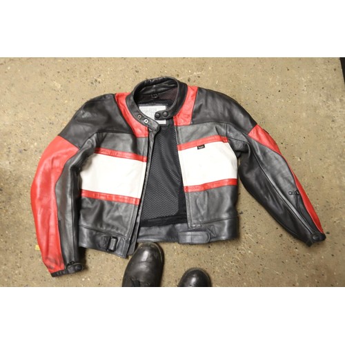 131 - Leather Triumph bikers jacket & trousers