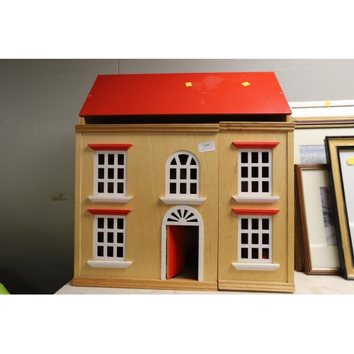 169 - Wooden doll house and quantity of furniture