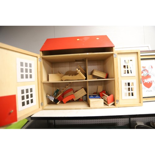 169 - Wooden doll house and quantity of furniture