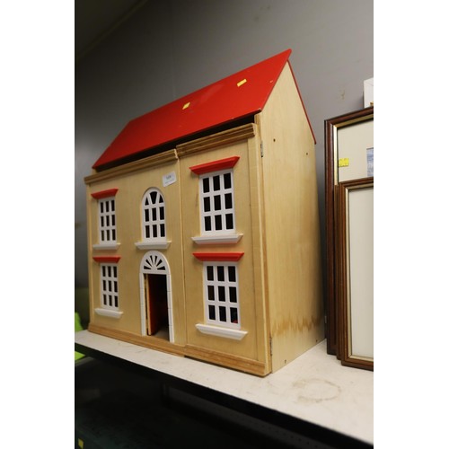 169 - Wooden doll house and quantity of furniture