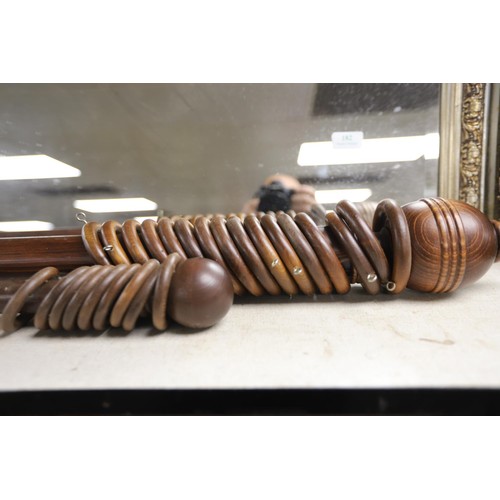 181 - 2 wooden curtain poles &