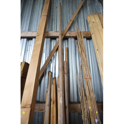 39 - Qty of various round wooden poles