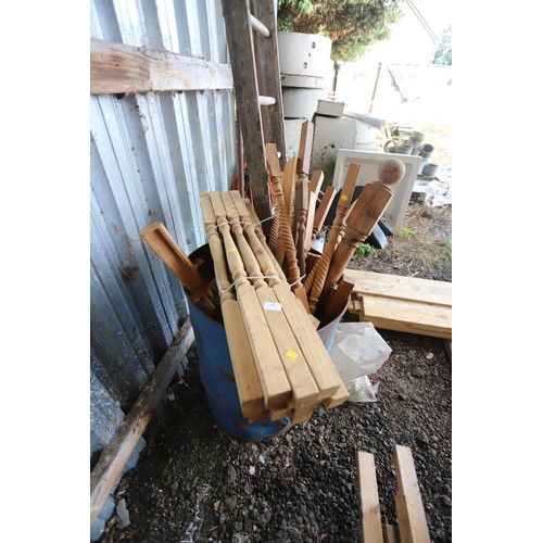 56 - Blue 40 gallon drum, incl various wooden stair rails etc