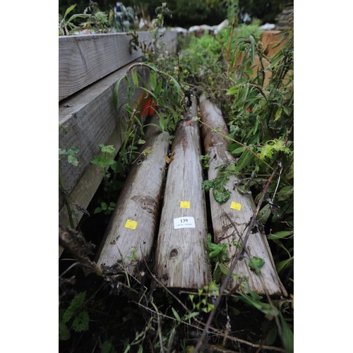 139 - 3 x round wooden posts