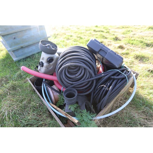 238 - Wooden crate of various wire conduit, water containers etc