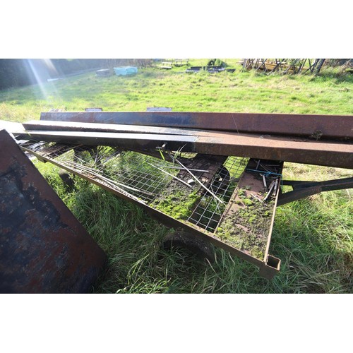 266 - Mesh 4 wheel trailer & 4 large metal posts approx. 138 inches long