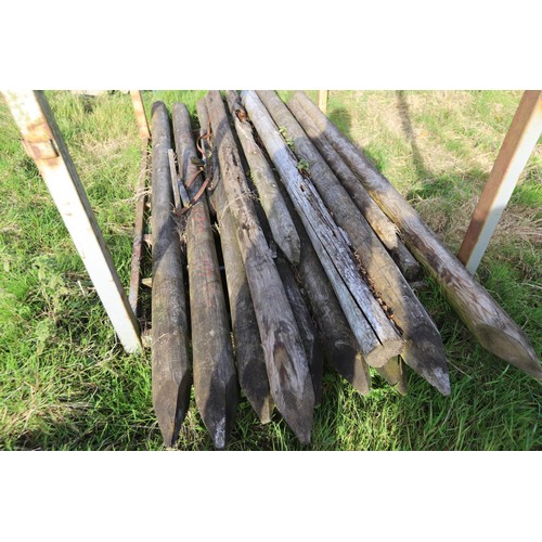 280 - Large metal crate, incl qty of wooden posts