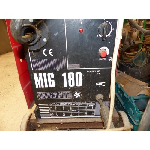 584 - Mig 180 turbofan cooled welder & box, incl welding mask, welding rods etc  – to be tested rewired an... 