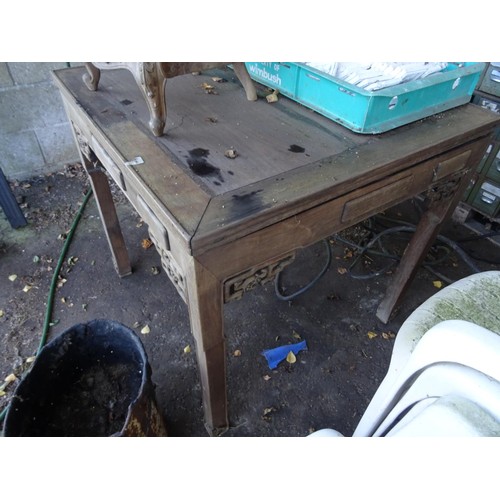 715 - Reproduction Indonesian mahogany desk with several drawer compartments