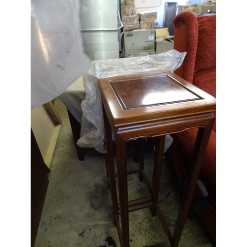 746 - Pair of Indonesian mahogany plant stands