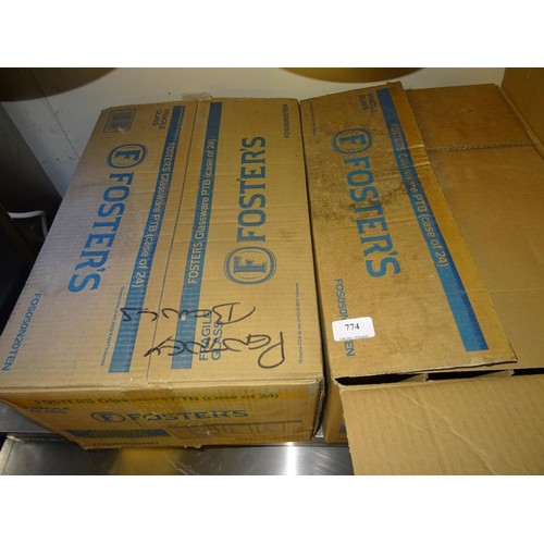 774 - 2 x boxes of Fosters pint glasses NB 11 glasses missing out of open box