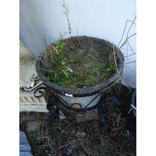 829 - Small metal planter standing in metal base