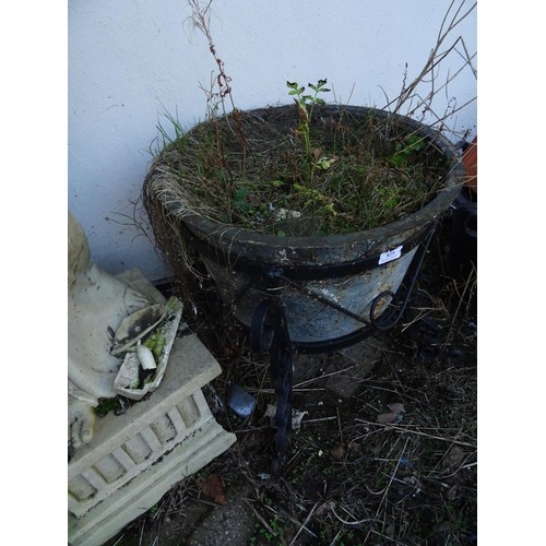 829 - Small metal planter standing in metal base