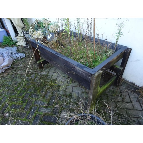 830 - 2 x large wood troughs