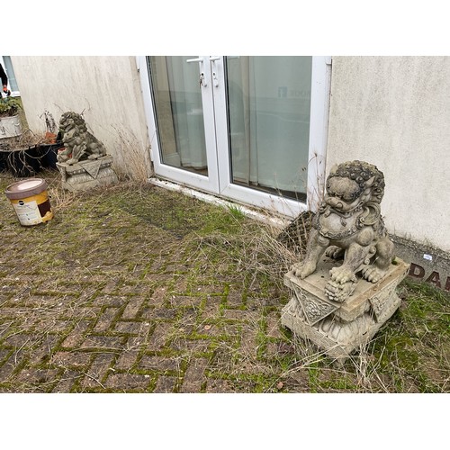 835 - Pair of resin Chinese modern foo dogs garden ornaments. 1 a/f - both coming 2 parts total measuremen... 