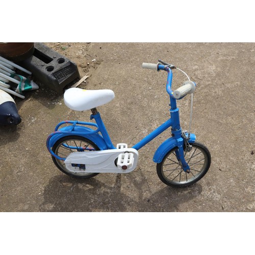 77 - Childs blue bicycle