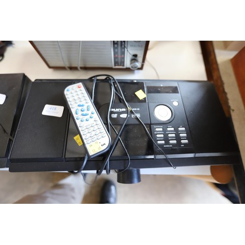 308 - Auna multimedia electronic star DVD/video/MP3 with remote - warranted until 12 noon Tuesday followin... 