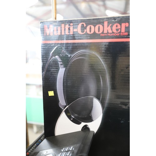 310 - Cookshop electric multi cooker (new) - warranted until 12 noon Tuesday following the above sale