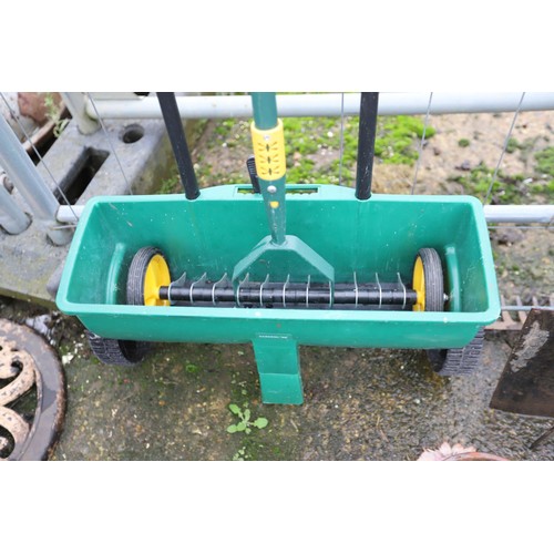 27 - Lawn spreader & telescopic lawn scarifier